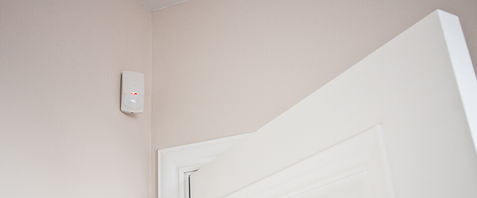 Motion sensor in the corner of a room